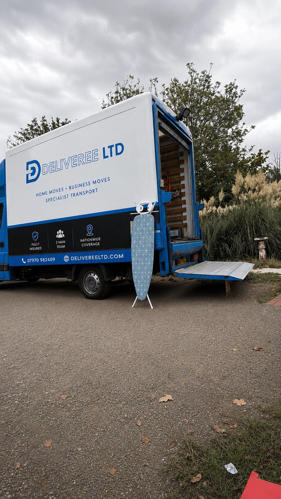 Deliveree van with the tail lift down and rear doors open, part way through a move