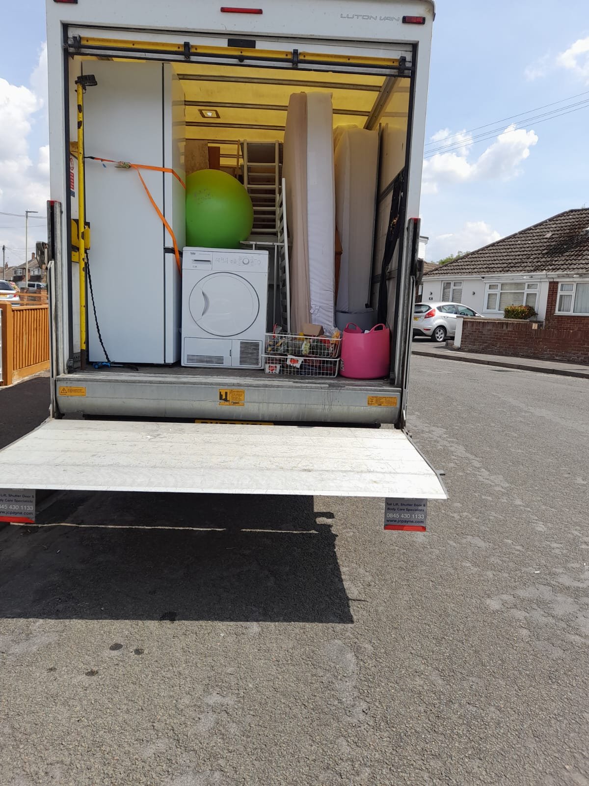 Removal van packed with equipment and furniture