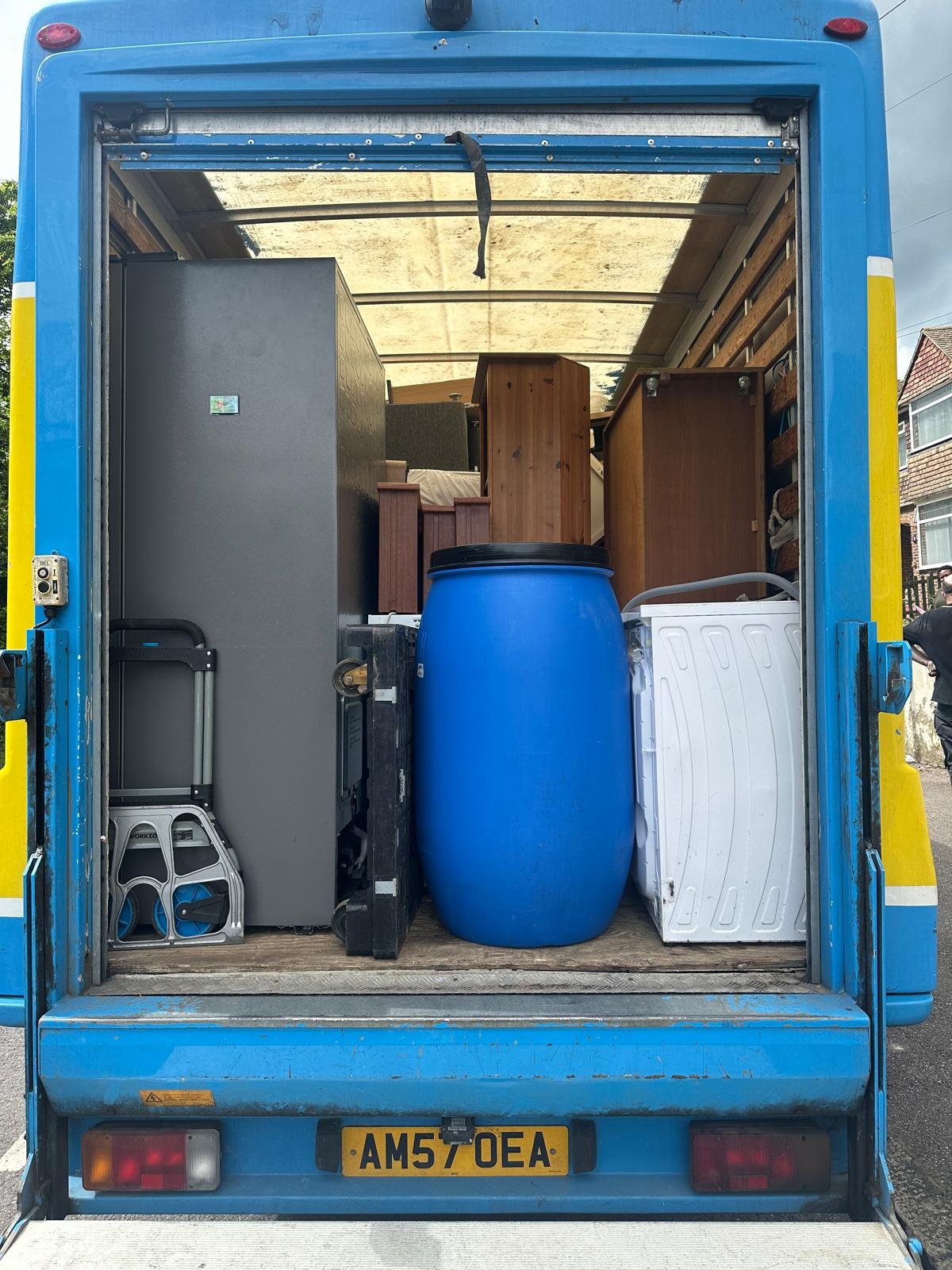 Van loaded with furniture and appliances